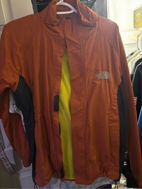 The North Face Men’s Rust Orange Windbreaker with Black Panels
